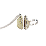 Collezione “Inseparabili”: set anello e pendente con catena in argento rodiato
